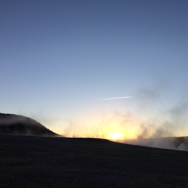 Waking Up in the Wilderness Book | Sunrise over geyser mist